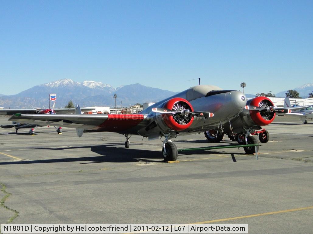 N1801D, 1952 Beech D18S C/N A-816, Covered and tied down with tow bar attached