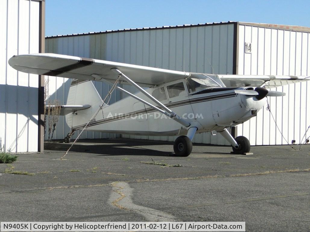 N9405K, 1947 Stinson 108-2 Voyager C/N 108-2405, Parked between the hangers