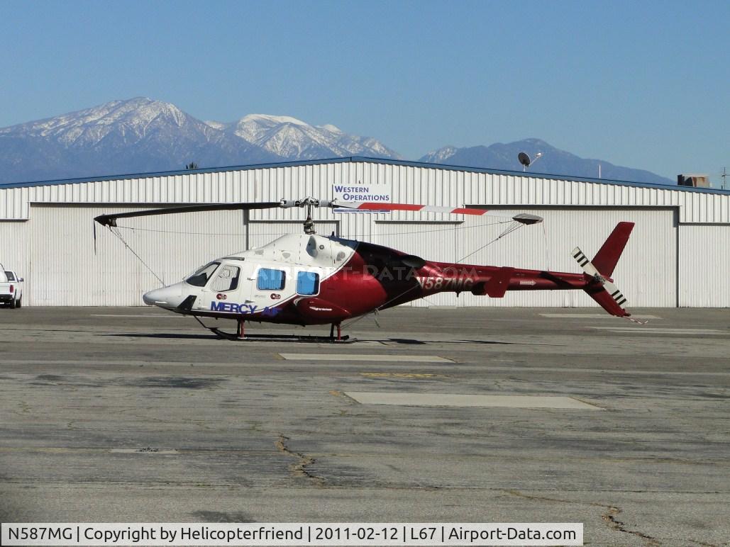N587MG, 1987 Bell 222U C/N 47566, Parked and tied down at Mercy Air Services. This ship is used for training purposes