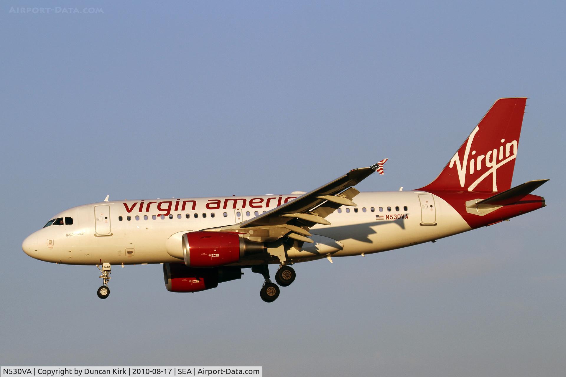 N530VA, 2008 Airbus A319-115 C/N 3686, Evening landing shot on 34L