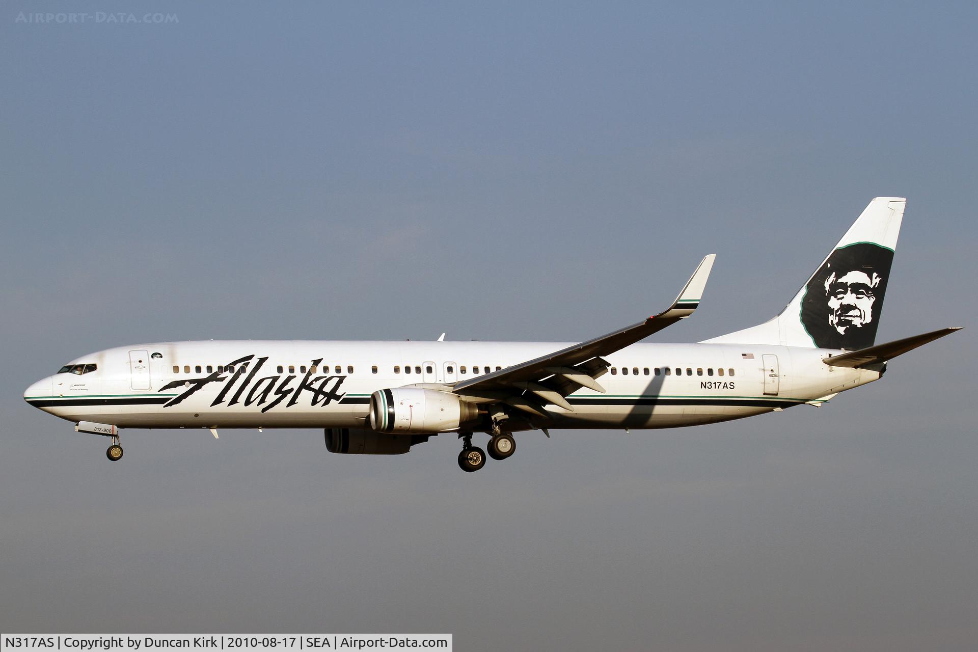 N317AS, 2003 Boeing 737-990 C/N 30856, Landing on 34L