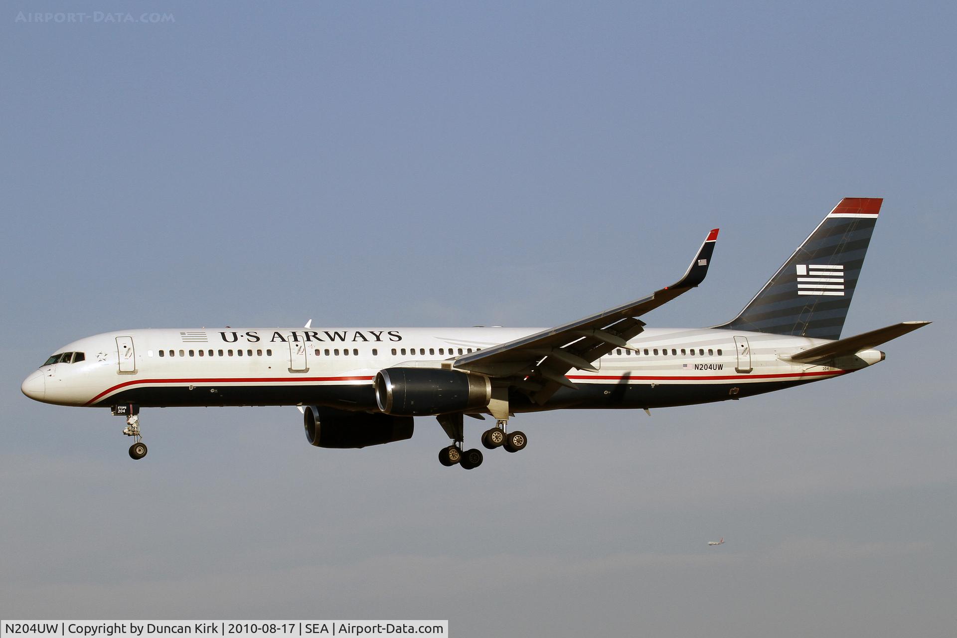 N204UW, 2000 Boeing 757-23N C/N 30886, Airborne B.767 landing at BFI in the background