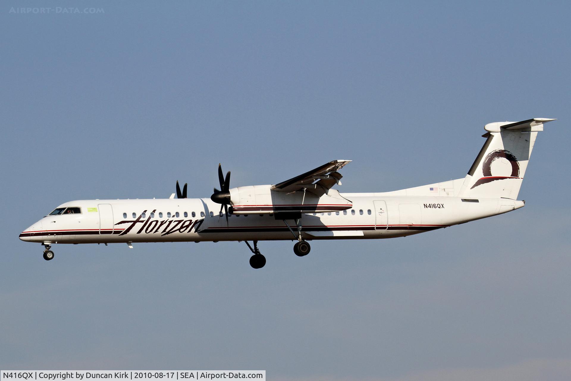 N416QX, 2001 Bombardier DHC-8-402 Dash 8 C/N 4083, Landing on 34L