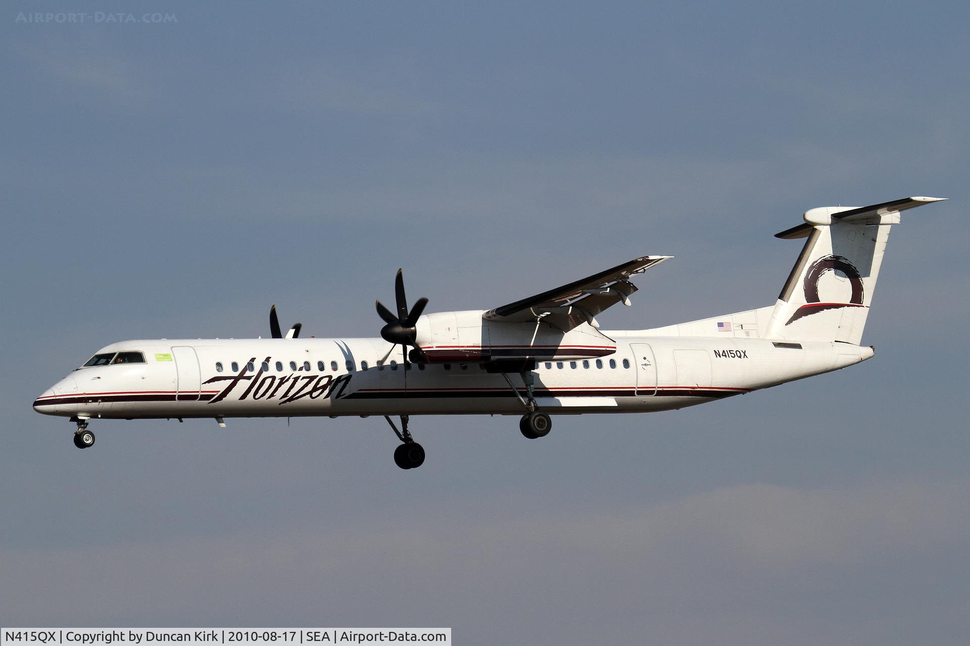 N415QX, 2003 De Havilland Canada DHC-8-402 Dash 8 C/N 4081, Landing on 34L