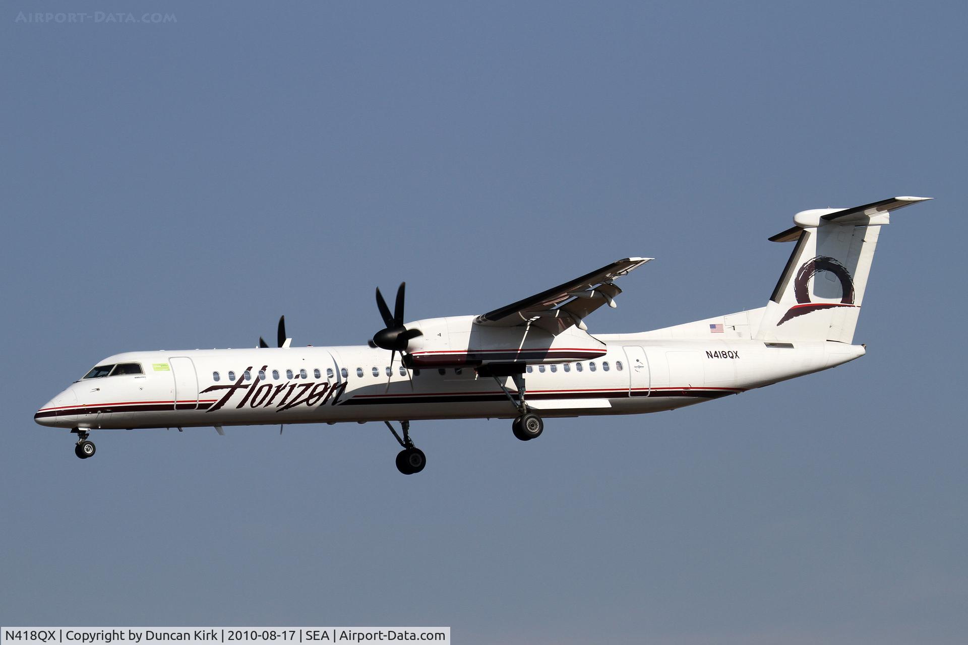 N418QX, 2007 Bombardier DHC-8-402 Dash 8 C/N 4143, Landing on 34L