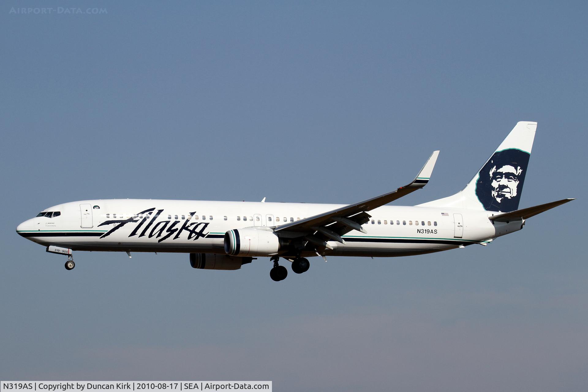 N319AS, 2003 Boeing 737-990 C/N 33679, Landing on 34L