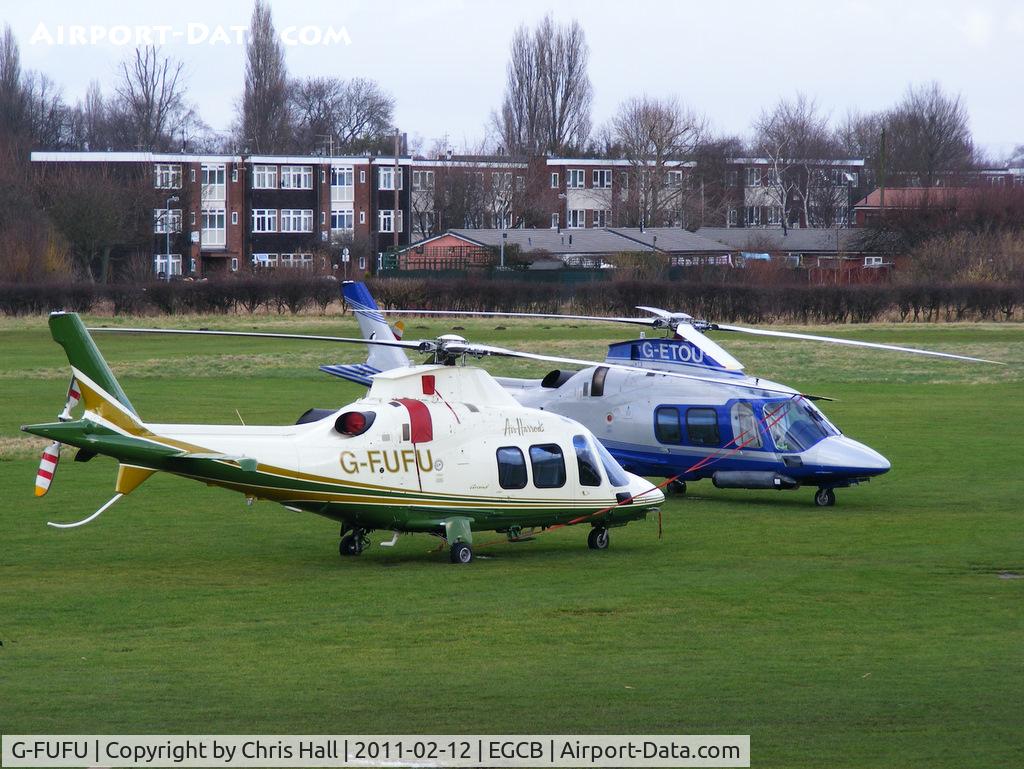 G-FUFU, 2007 Agusta A-109S Grand C/N 22058, Air Harrods A109 with G-ETOU behind it