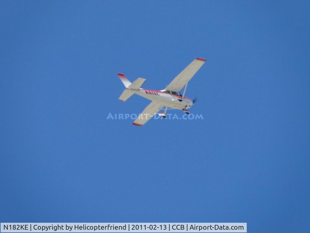 N182KE, 1975 Cessna 182P Skylane C/N 18263657, Crossing the airport above 2500 ft and heading north east