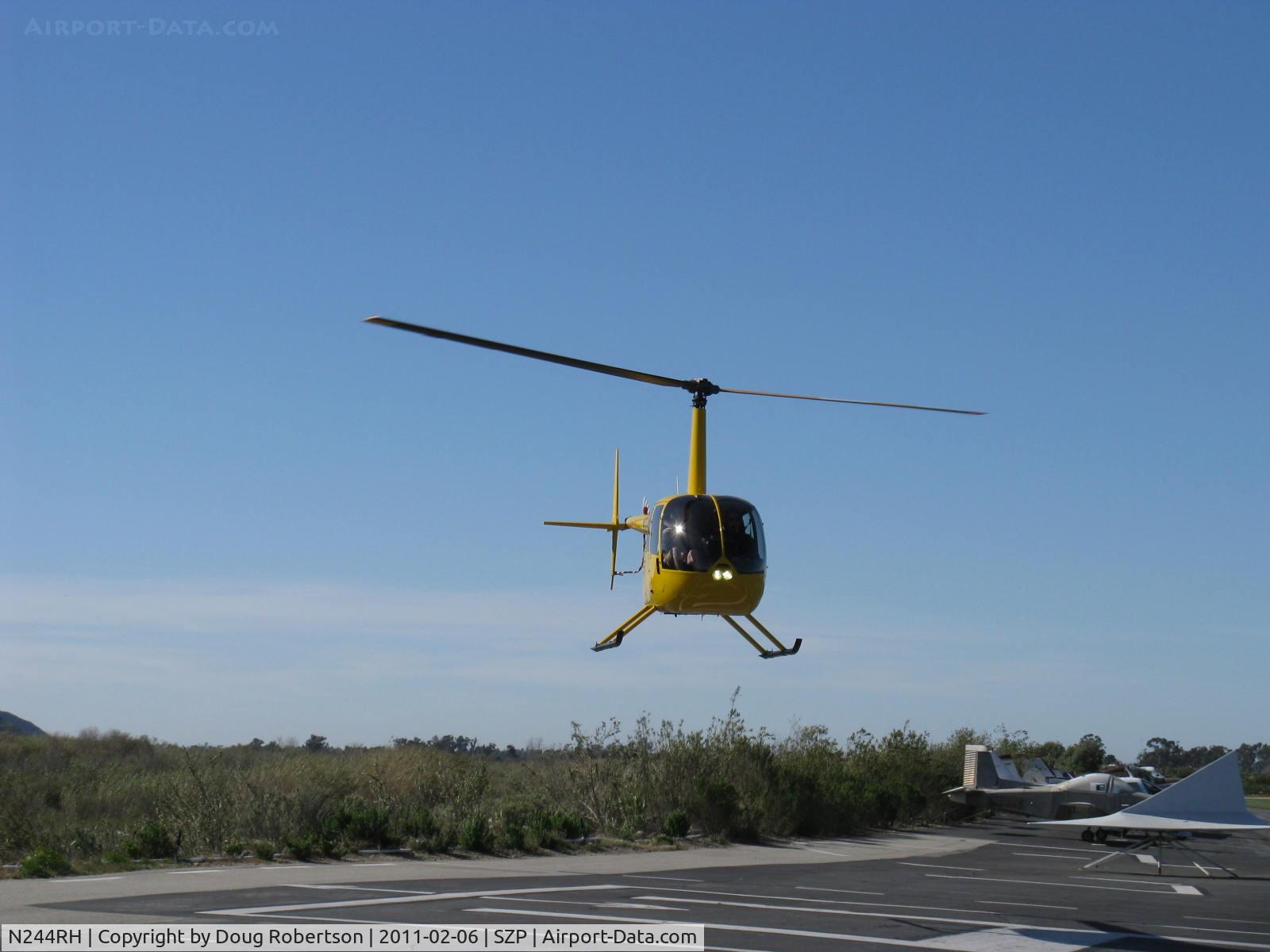 N244RH, 1992 Robinson R44 C/N 0004, 1992 Robinson R44, Lycoming O-540-F1, approach to SZP helipad