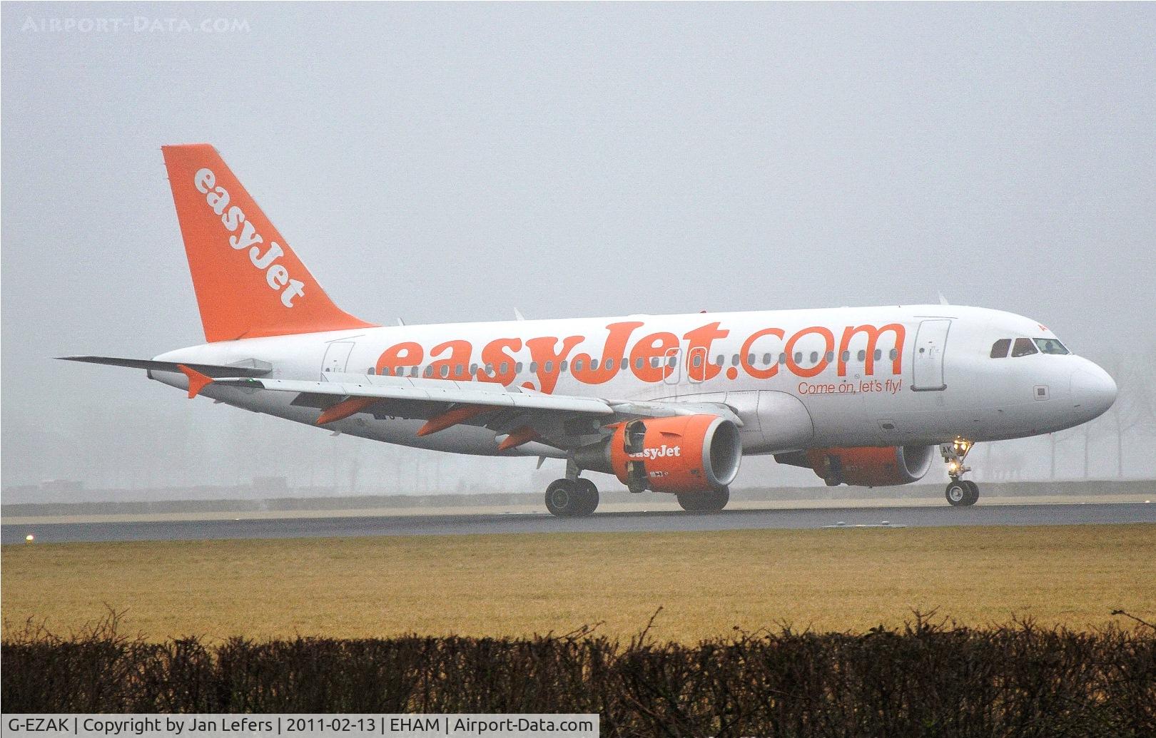 G-EZAK, 2006 Airbus A319-111 C/N 2744, Foggy landing on the Polderbaan