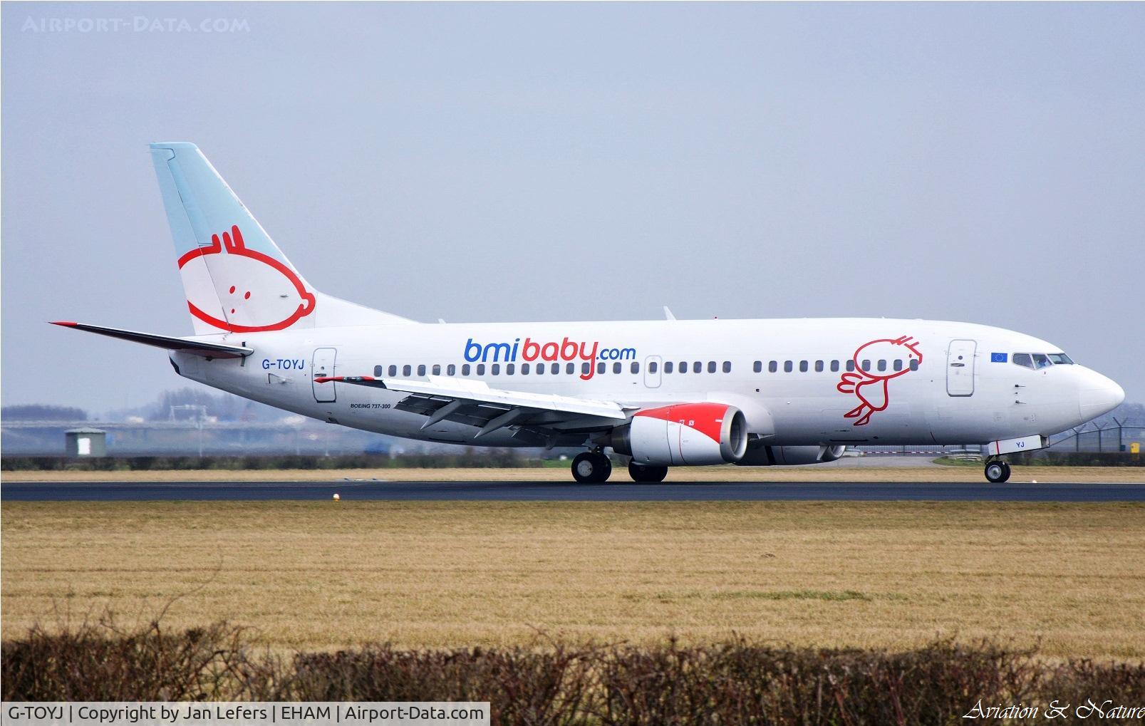 G-TOYJ, 1996 Boeing 737-36M C/N 28332, Landing on the Polderbaan