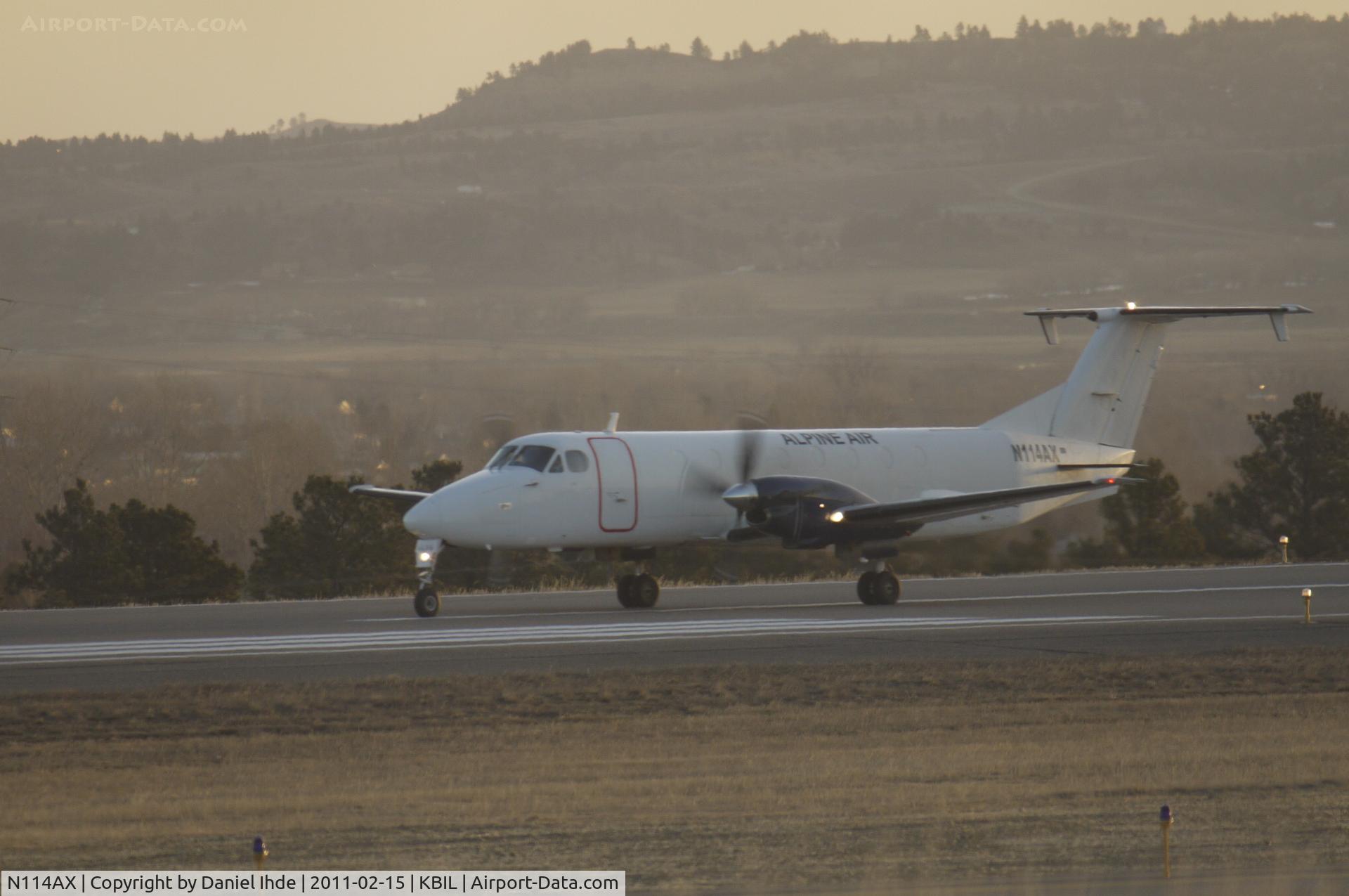 N114AX, 1988 Beech 1900C C/N UC-36, Alpine Air Beech 1900 Freighter departing KBIL on 28R