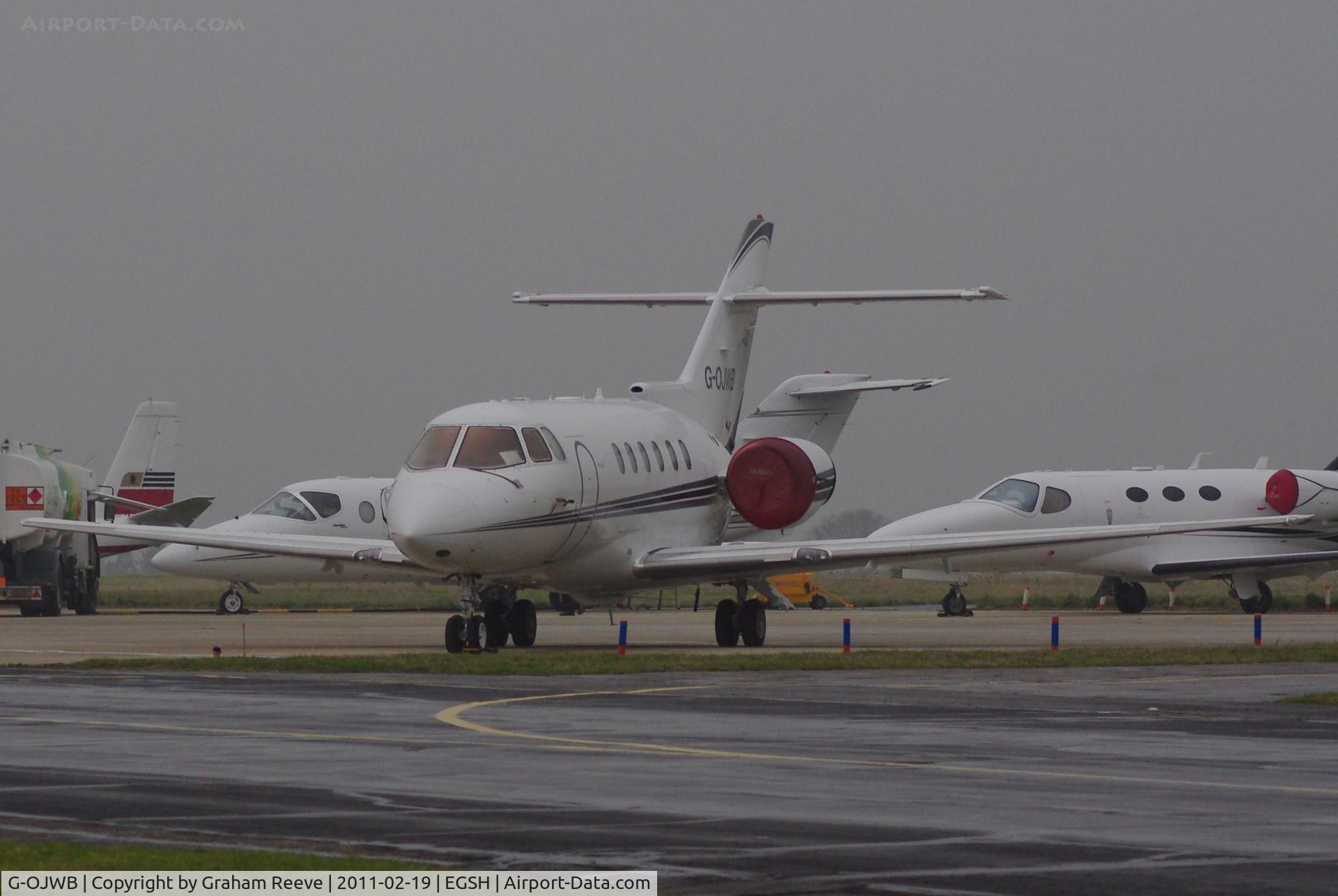 G-OJWB, 2004 Raytheon Hawker 800XP C/N 258674, Parked at Norwich on a wet morning.