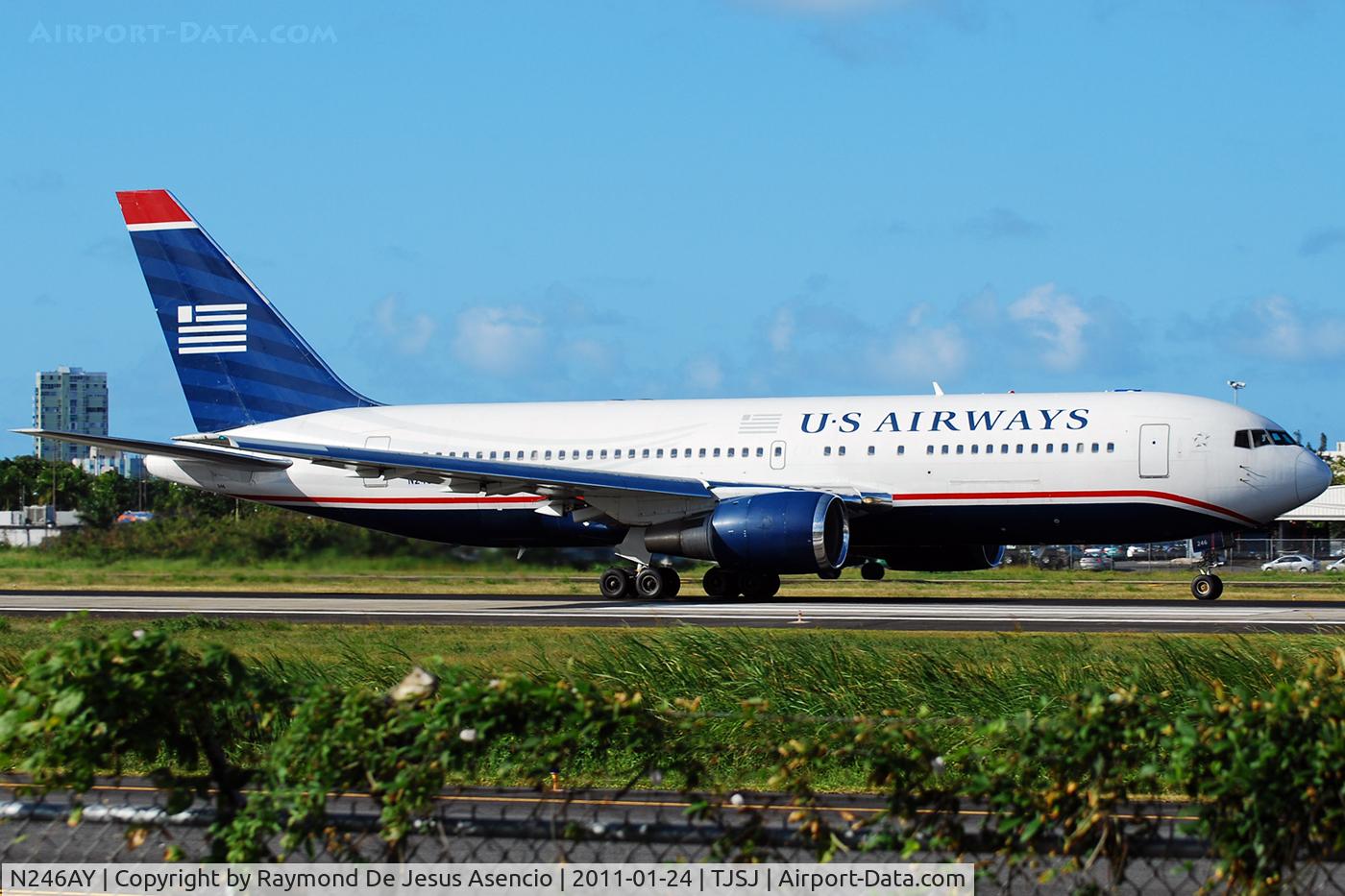 N246AY, 1987 Boeing 767-201ER C/N 23898, Look closely at the photo below ... You can see the iguana in the cyclone fence.