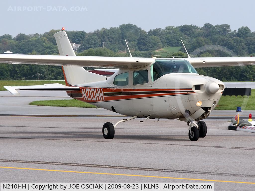 N210HH, 1976 Cessna 210L Centurion C/N 21061462, Arriving at Lancaster