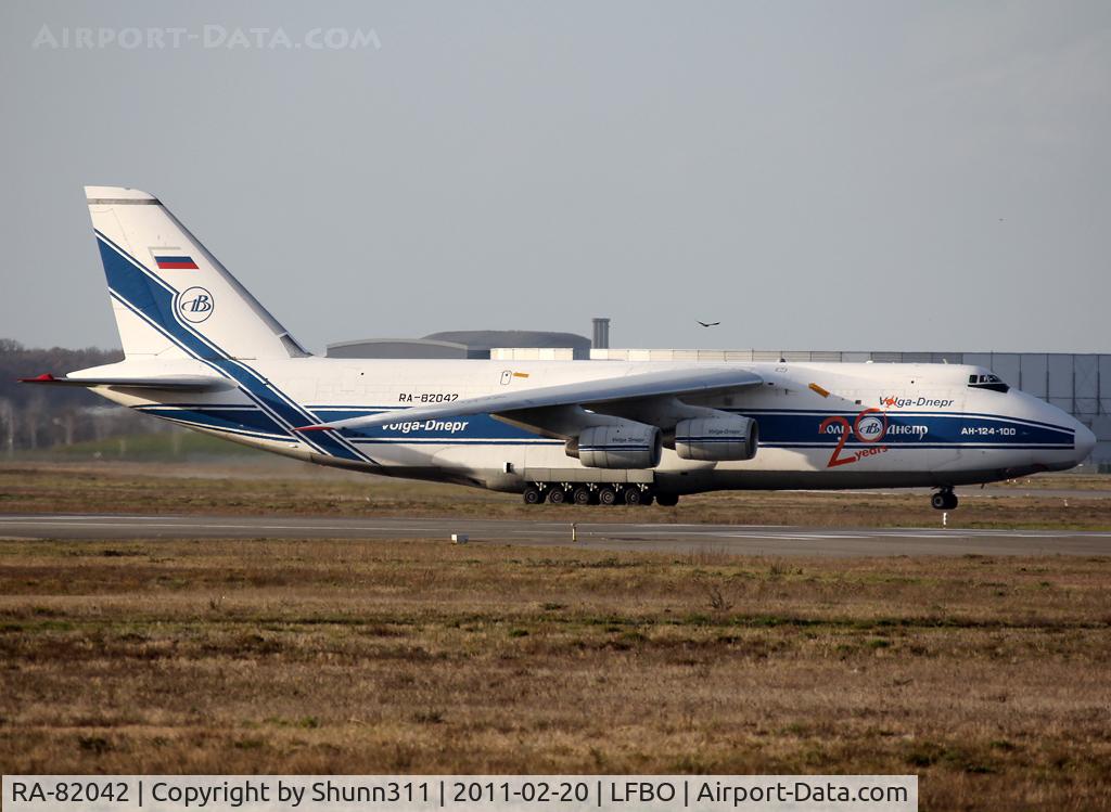 RA-82042, 1991 Antonov An-124-100 Ruslan C/N 9773054055093/0606, Taxiing to the Cargo area... Additional 20th birthday stickers...