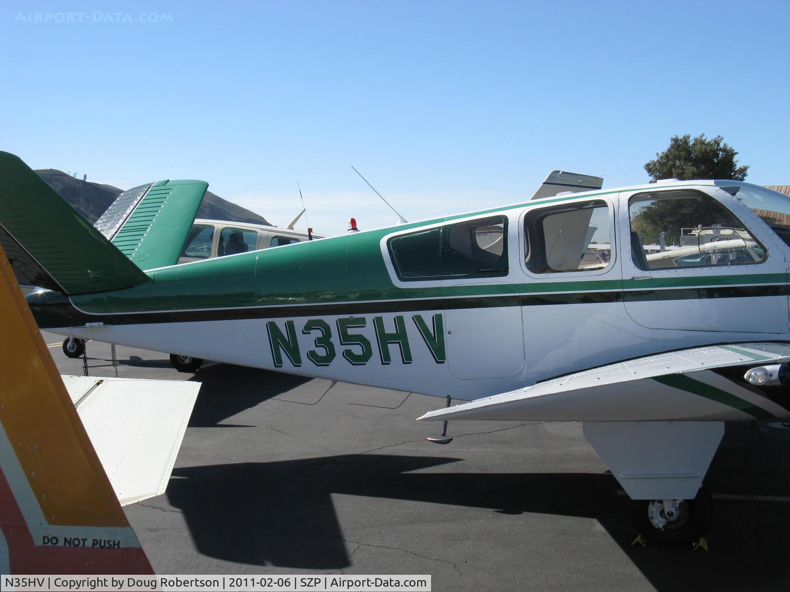 N35HV, 1957 Beech H35 Bonanza C/N D-5236, 1957 Beech H35 BONANZA, Continental O-470-G 240 Hp, H model strengthened V-tail spar caps and elevators. Paint scheme enlarges the appearance of triangular third window.