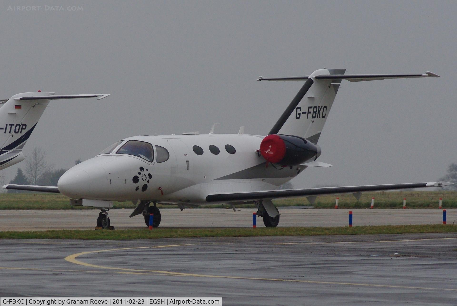 G-FBKC, 2008 Cessna 510 Citation Mustang Citation Mustang C/N 510-0127, Parked at Norwich on a wet afternoon.