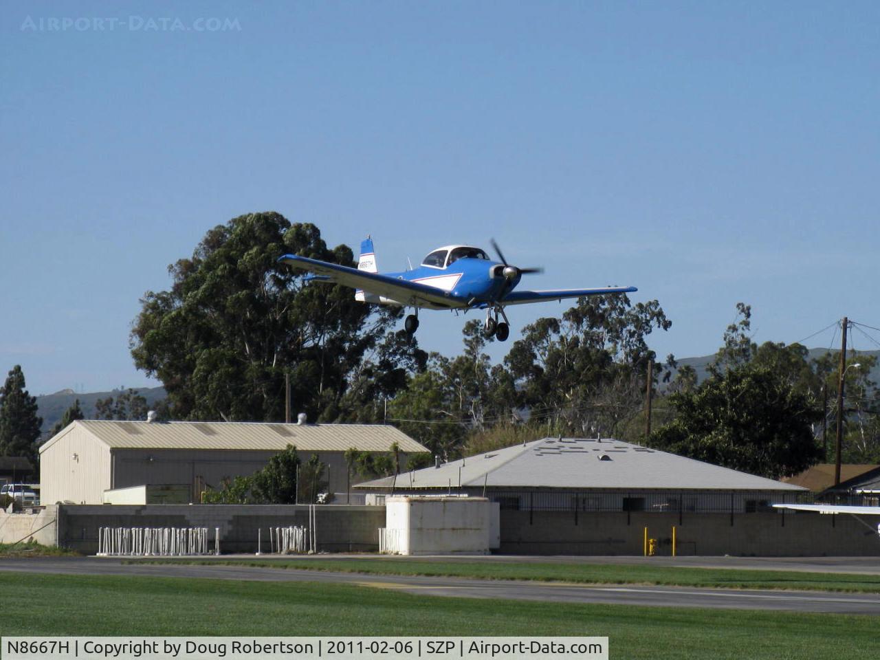 N8667H, 1947 North American Navion C/N NAV-4-667, 1947 North American NAVION, Continental IO-520 285 Hp, on final Rwy 04 with Young Eagles riders. This aircraft & pilot have given well over 600 Young Eagles free aircraft rides.