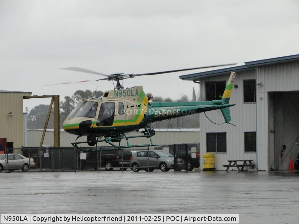 N950LA, 2010 Eurocopter AS-350B-2 Ecureuil Ecureuil C/N 4930, Air taxiing from Sheriff helipad to taxiway Sierra to take off westbound