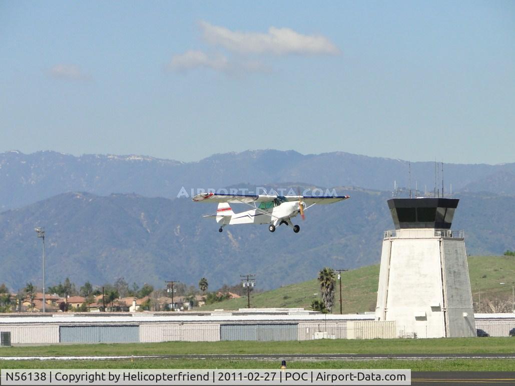 N56138, 1943 Taylorcraft DCO-65 C/N L-5719, Passing the tower on take off