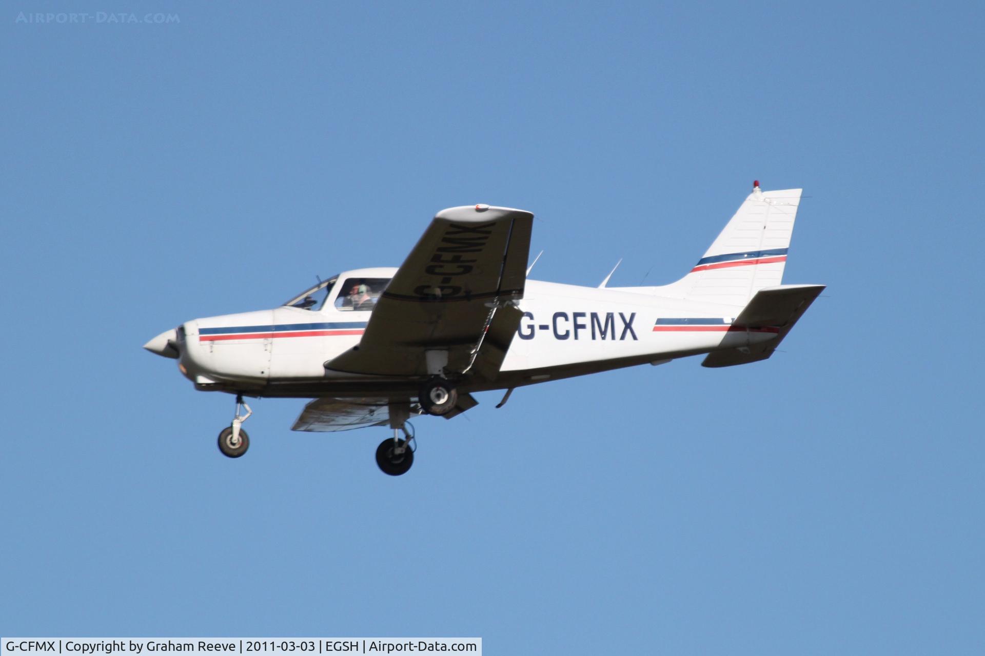 G-CFMX, 1983 Piper PA-28-161 Cherokee Warrior II C/N 28-8316073, Landing at Norwich.