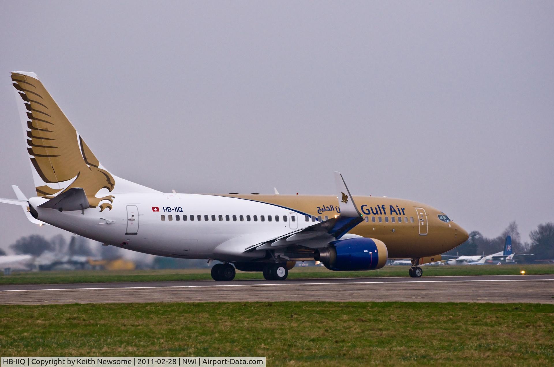 HB-IIQ, 1999 Boeing 737-7CN BBJ C/N 30752, HB-IIQ about to leave Norwich following spray into Gulf Air colour scheme for a lease period.