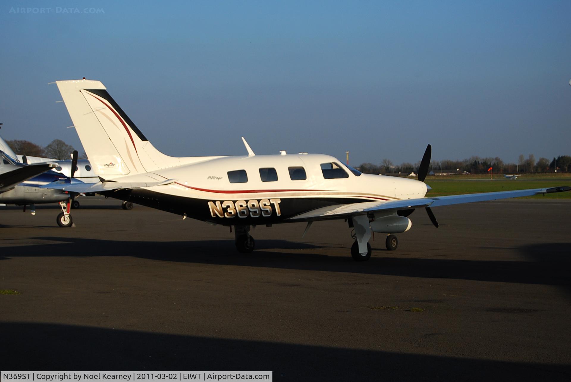 N369ST, 2006 Piper PA-46-350P Malibu Mirage C/N 4636396, Parked on the apron at Weston