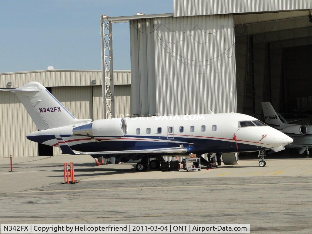 N342FX, 2008 Bombardier Challenger 605 (CL-600-2B16) C/N 5752, Parked on the southside and people around