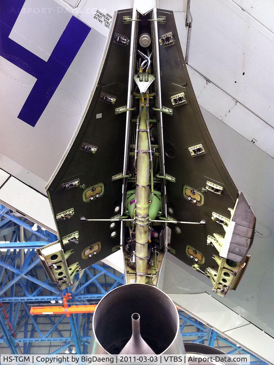 HS-TGM, 1992 Boeing 747-4D7 C/N 27093, Hydraulic compartment behind engine number 1 pylon open for maintenance.