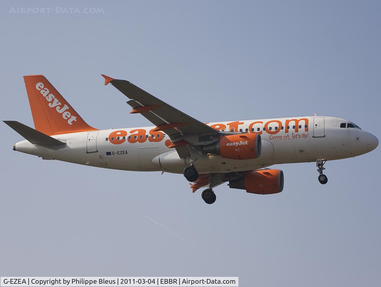 G-EZEA, 2003 Airbus A319-111 C/N 2119, Low cost British visitor on short final rwy 02 by a sunny but cold day with NE winds. You don't see it but of course the plane has FOUR emergency exits and not two. Special to EasyJet.