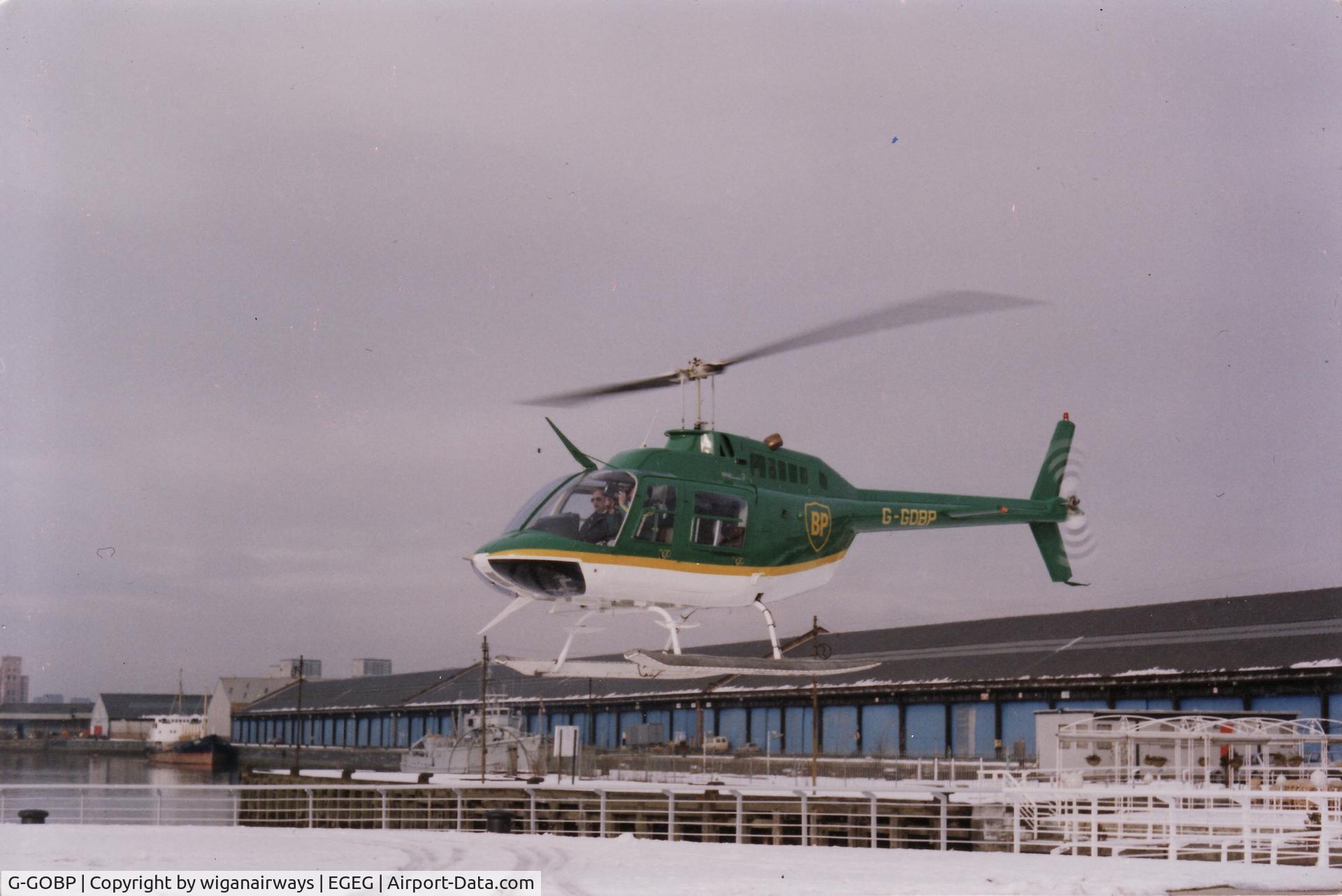 G-GOBP, 1974 Bell 206B JetRanger II C/N 1376, in BP colours for Radio Clyde's traffic reports,Clyde Helicopters, Glasgow Heliport