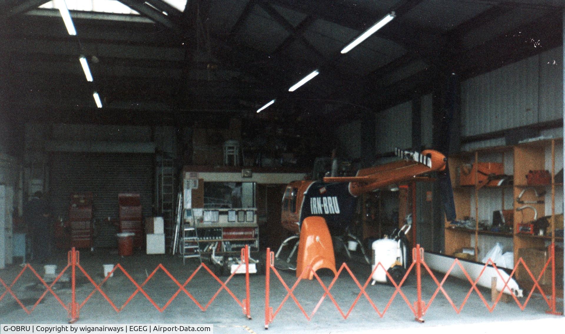 G-OBRU, 1974 Bell 206B JetRanger II C/N 1376, in the hanger, having a bit of work done.