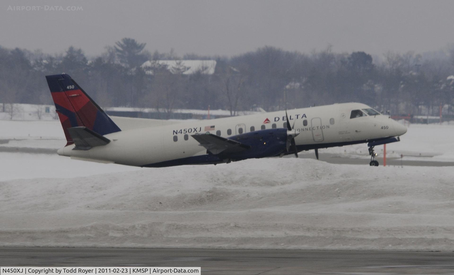 N450XJ, 1998 Saab 340B+ C/N 340B-450, climbing above the snow