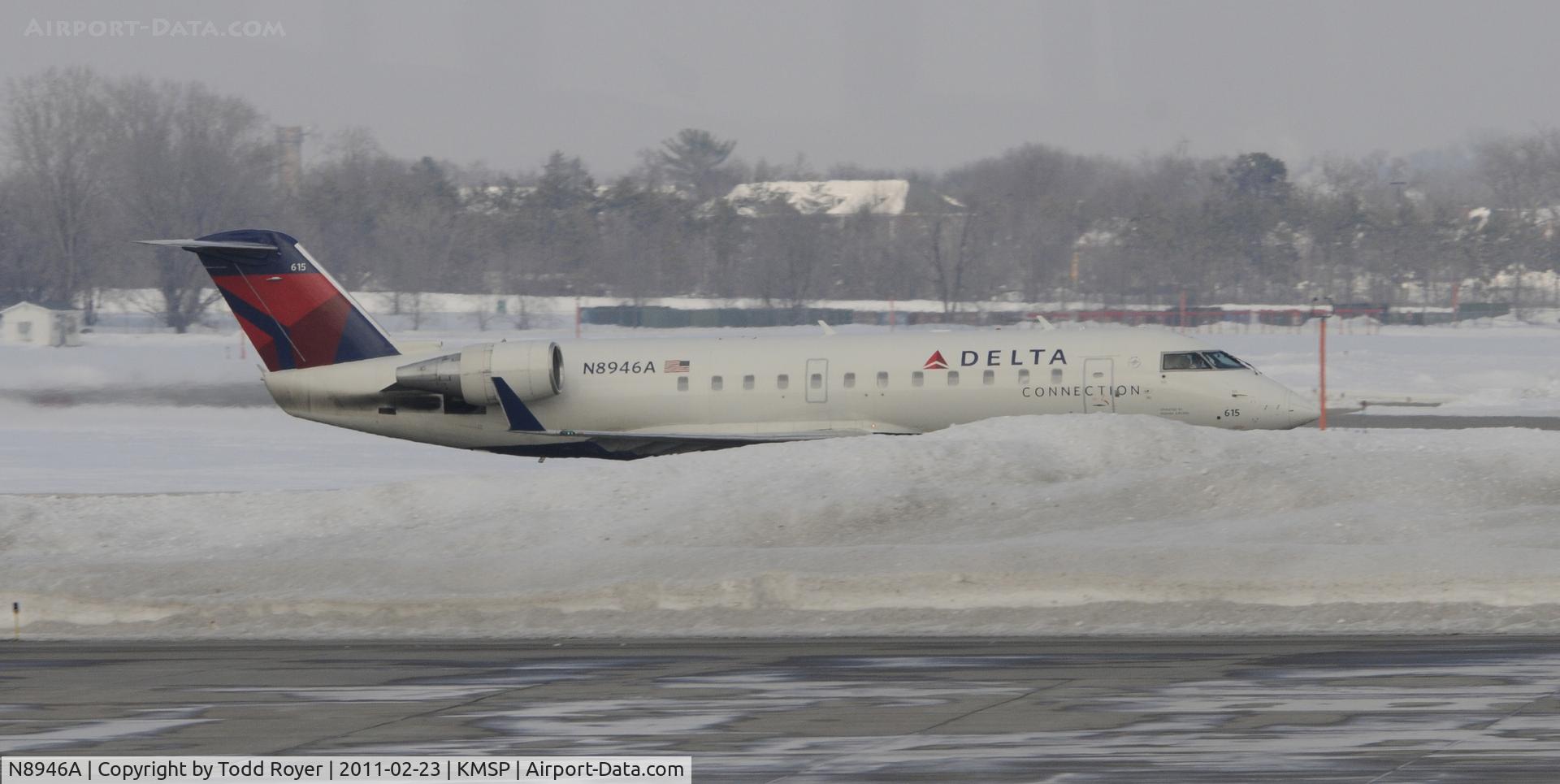 N8946A, 2004 Bombardier CRJ-200 (CL-600-2B19) C/N 7946, In the deep snow at MSP