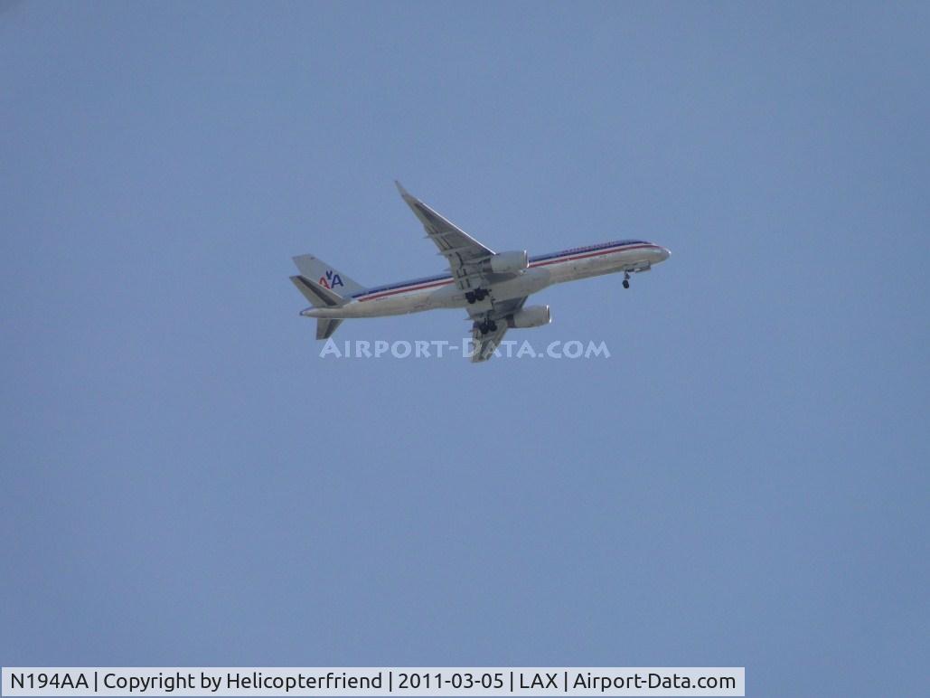 N194AA, 2001 Boeing 757-223 C/N 32388, On final to runway 25 passing over the City of Bell