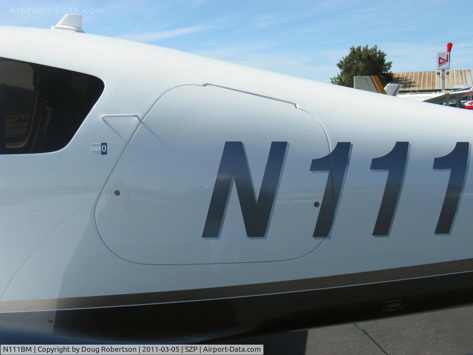 N111BM, 2006 Columbia Aircraft Mfg LC42-550FG C/N 42540, 2006 Columbia Aircraft LC42-550FG COLUMBIA 350, Continental IO-550-N 310 Hp, baggage door