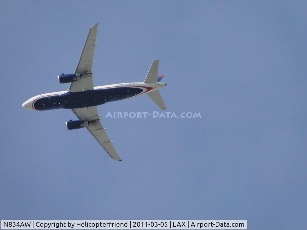 N834AW, 2004 Airbus A319-132 C/N 2302, On final to runway 24 passing over the City of Bell