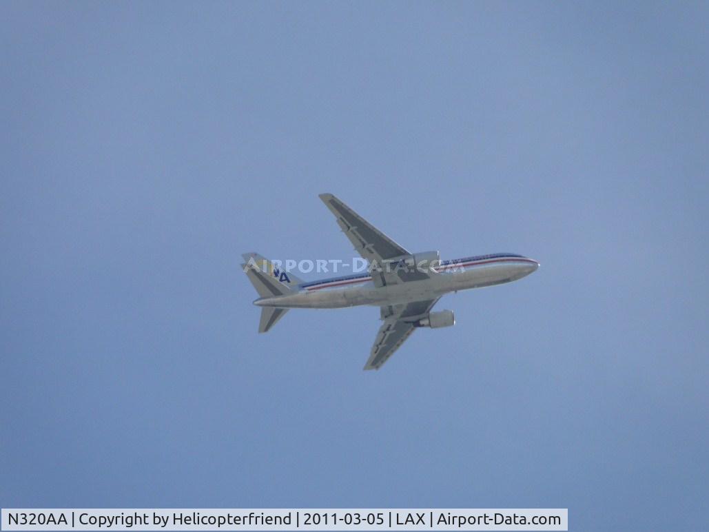 N320AA, 1985 Boeing 767-223 C/N 22321, On final to runway 24 passing over the City of Bell, With the rollout of Flagship Independence, American and American Eagle have six aircraft with yellow-ribbon decals and the slogan, “In support of all who serve,”