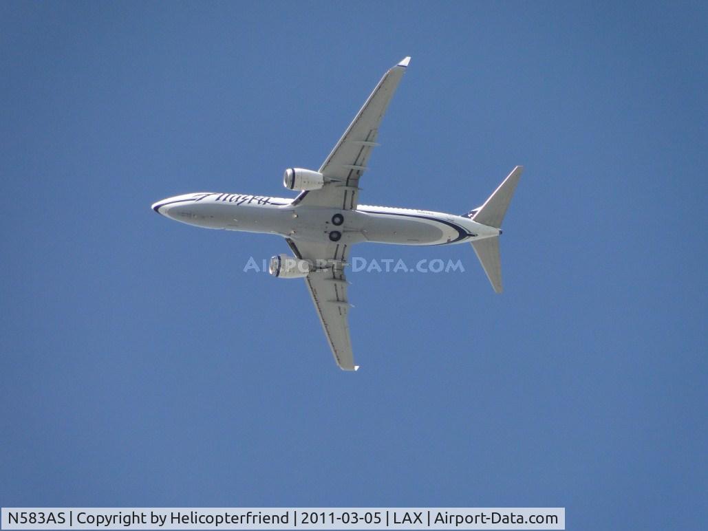 N583AS, 2007 Boeing 737-890 C/N 35681, On final to runway 24 passing over the City of Bell