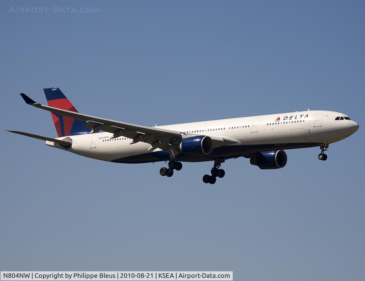 N804NW, 2003 Airbus A330-323 C/N 0549, My first Delta A330, I think. Short final rwy 34R. Who says Seattle has a rainy climate ?