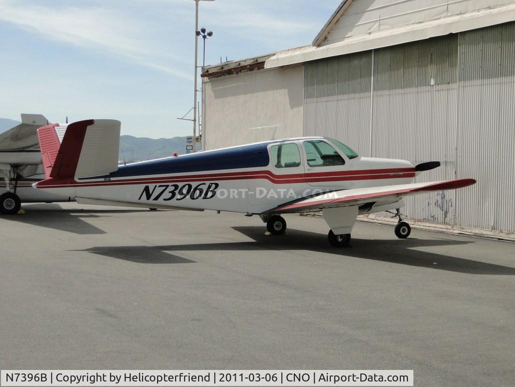 N7396B, 1954 Beech E35 C/N D-3872, Parked at a hanger