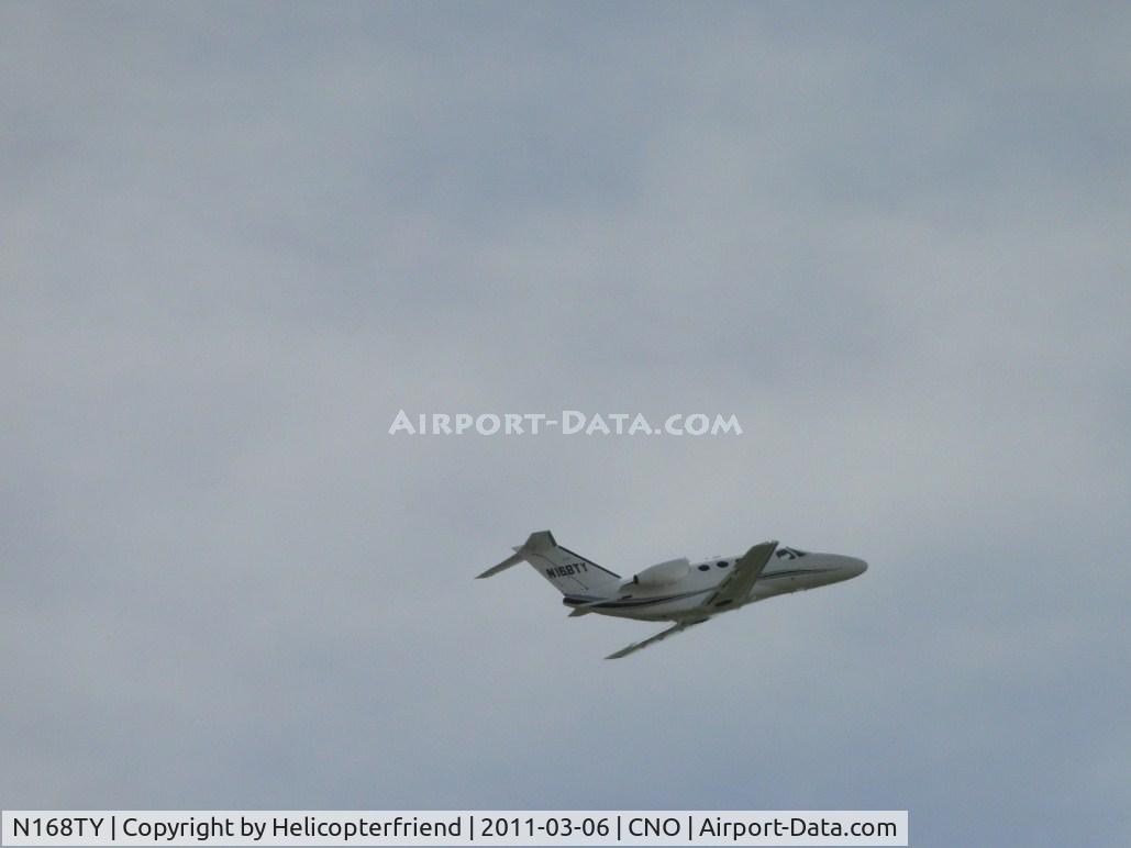 N168TY, 2010 Cessna 510 Citation Mustang Citation Mustang C/N 510-0297, Taking off from runway 26R wheels up and heading westbound