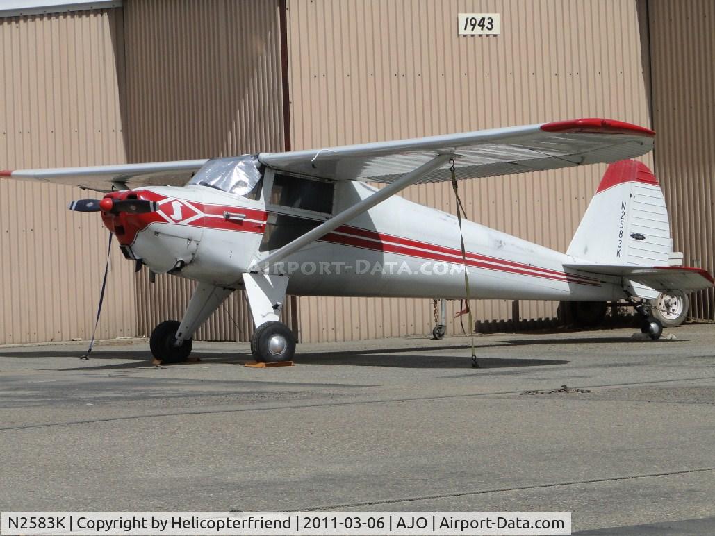 N2583K, 1947 Luscombe 8A C/N 5693, Tied down, windows covered and parked next to a hanger