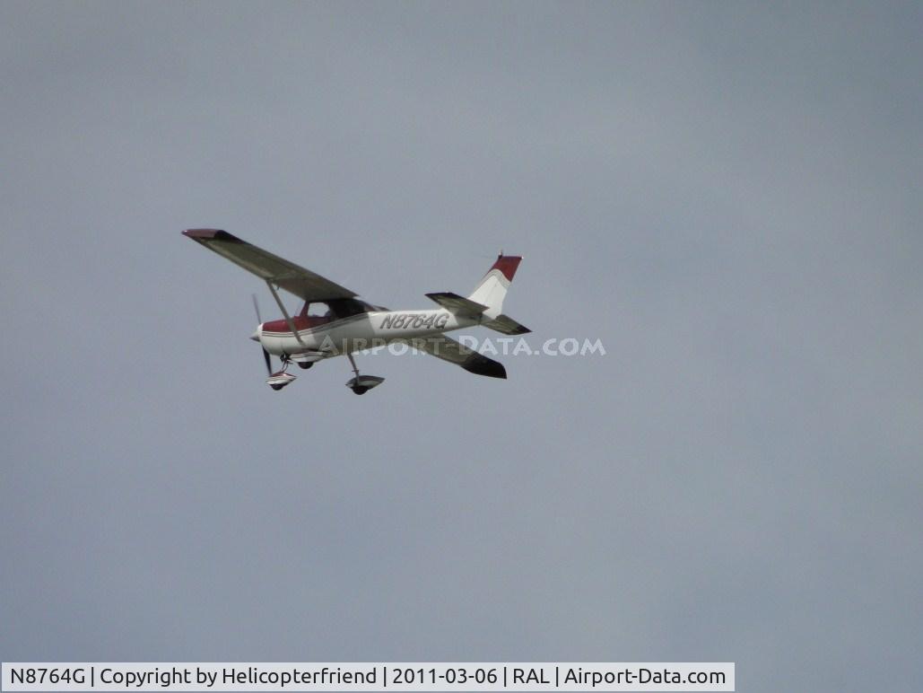 N8764G, 1966 Cessna 150F C/N 15062864, Just took off and heading southwest from runway 27