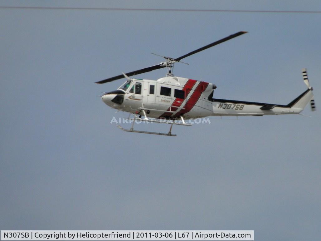 N307SB, 1975 Bell 212 C/N 30781, On final for runway 24 heading to the San Bernardino Sheriff's helipad area