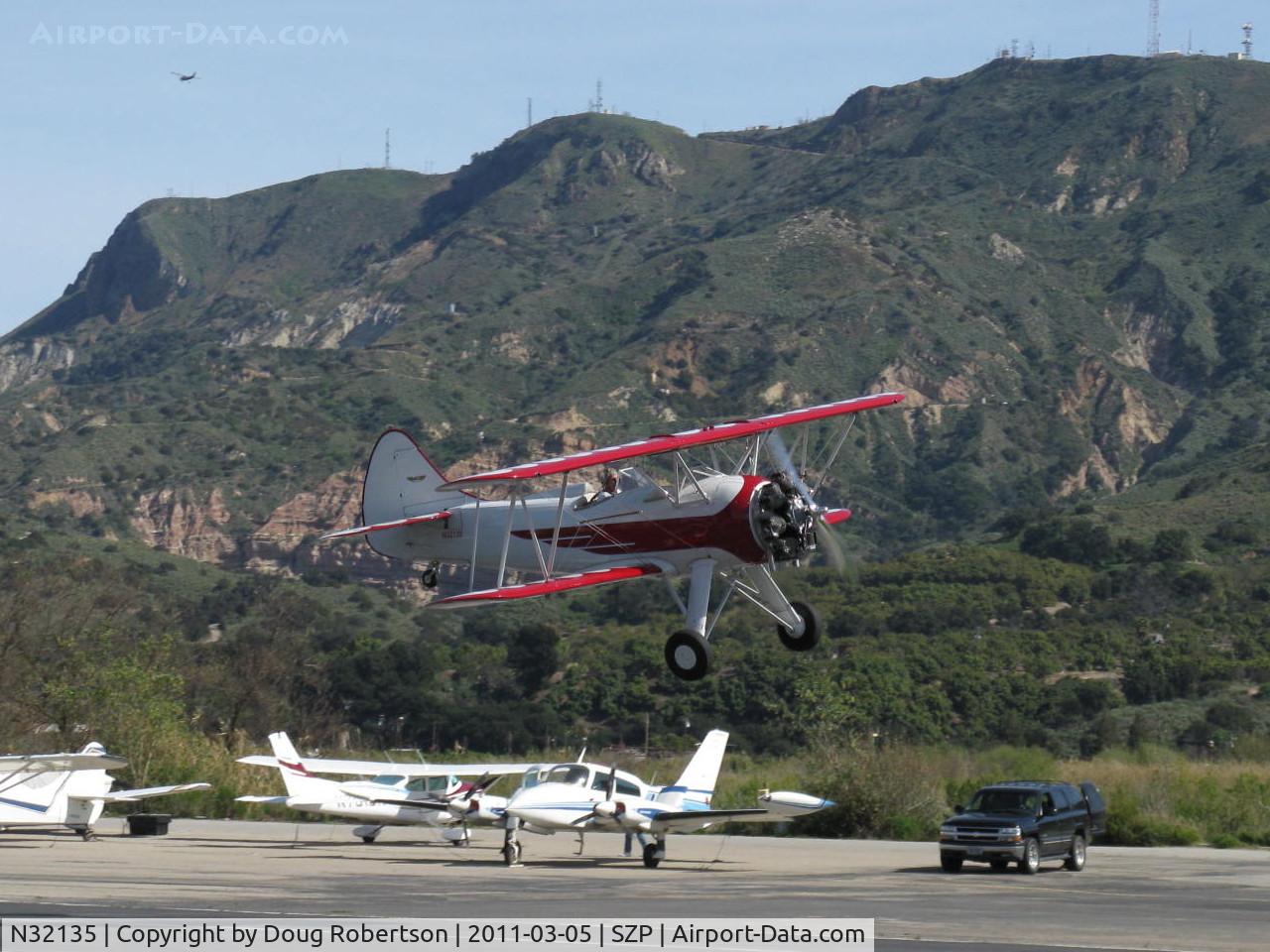 N32135, 1941 Waco UPF-7 C/N 5767, 1941 Waco UPF-7, Continental W670 220 Hp, takeoff climb Rwy 22