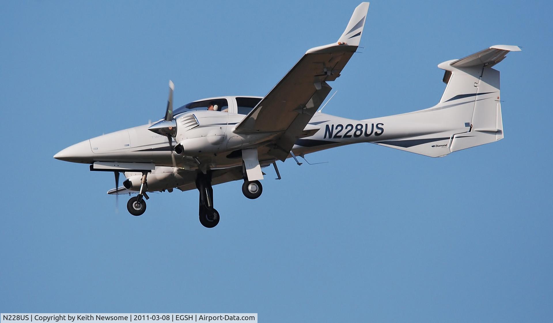 N228US, 2008 Diamond DA-42 Twin Star C/N 42.347, Landing in March sunshine