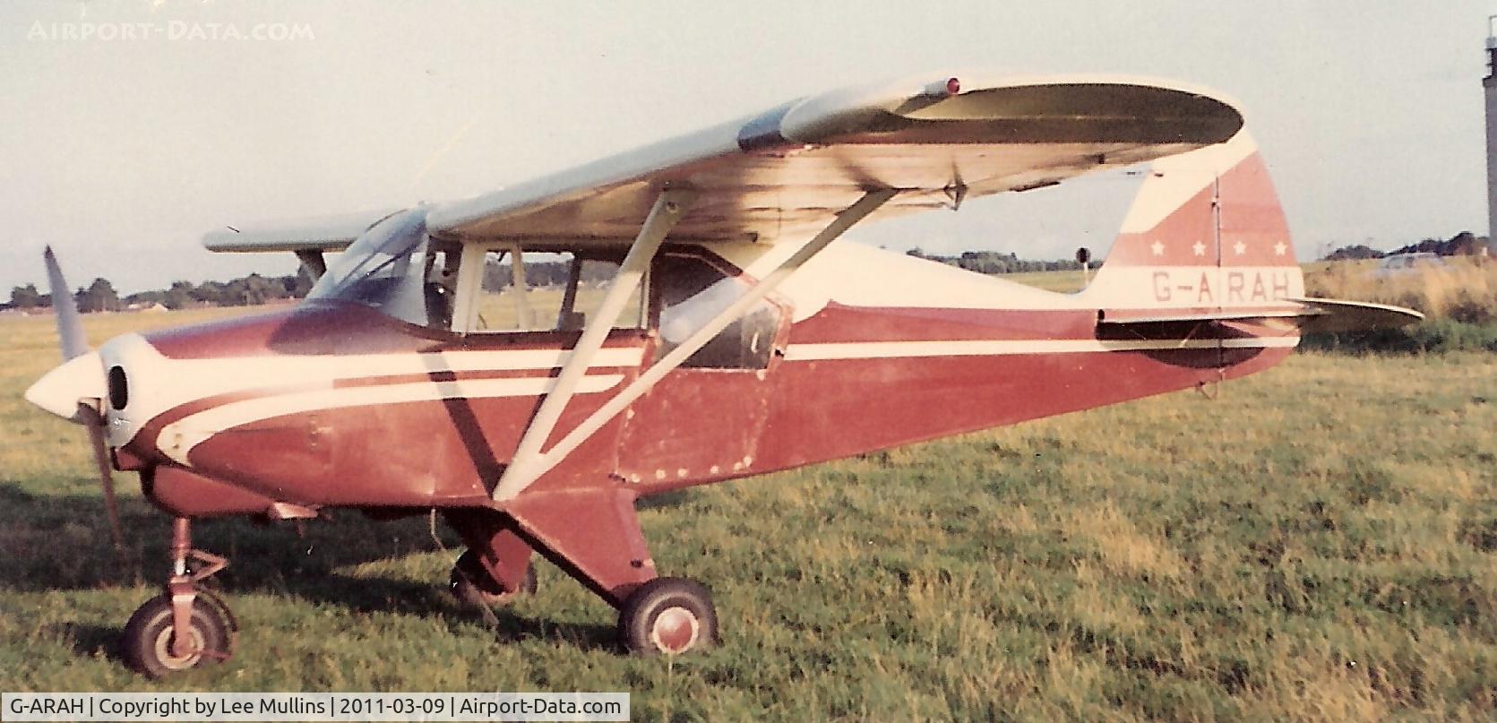 G-ARAH, 1960 Piper PA-22-160 Tri Pacer C/N 22-7423, Piper PA-22 in original Piper livery seen at Lymnpe, Kent in 1969. The large window at the rear of the cabin suggests it was probably used to photograph ships passing through the English Channel.