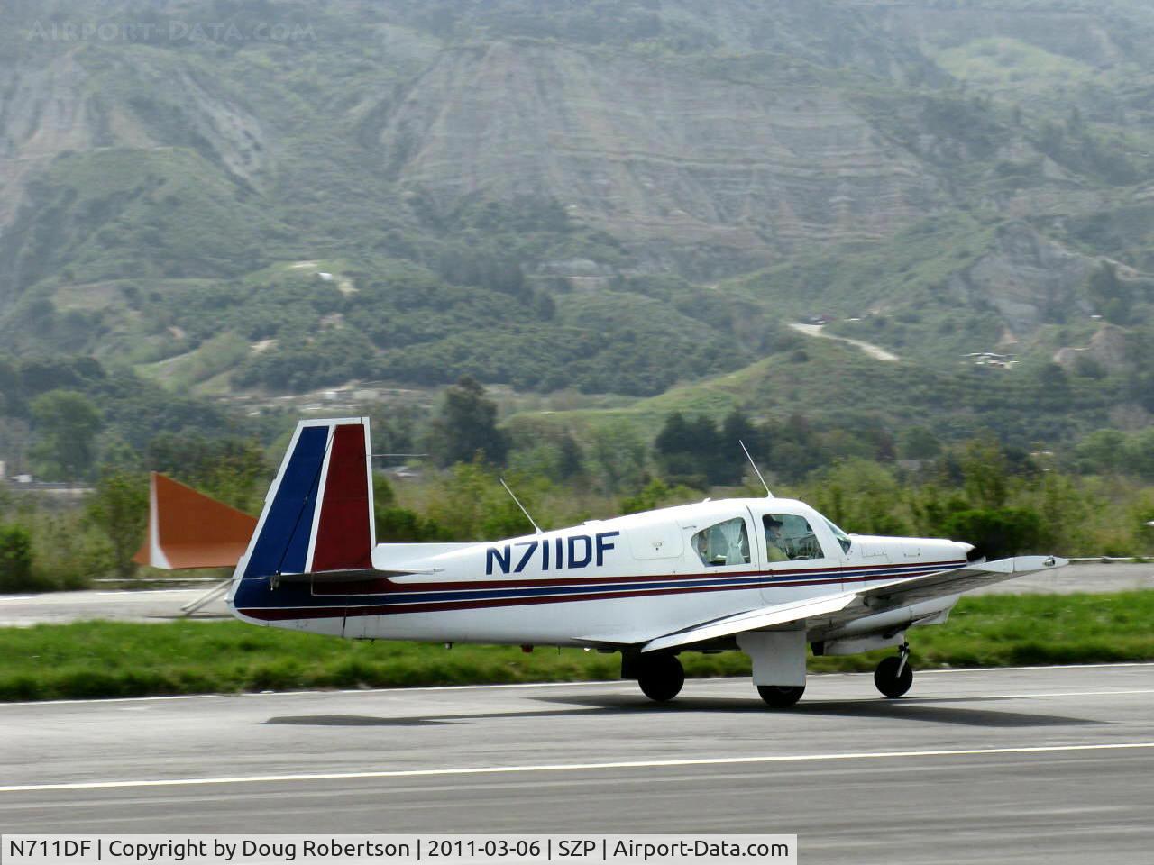 N711DF, 1963 Mooney M20C Ranger C/N 2532, 1963 Mooney M20C, Lycoming O&VO-360 180 Hp, landing roll Rwy 22